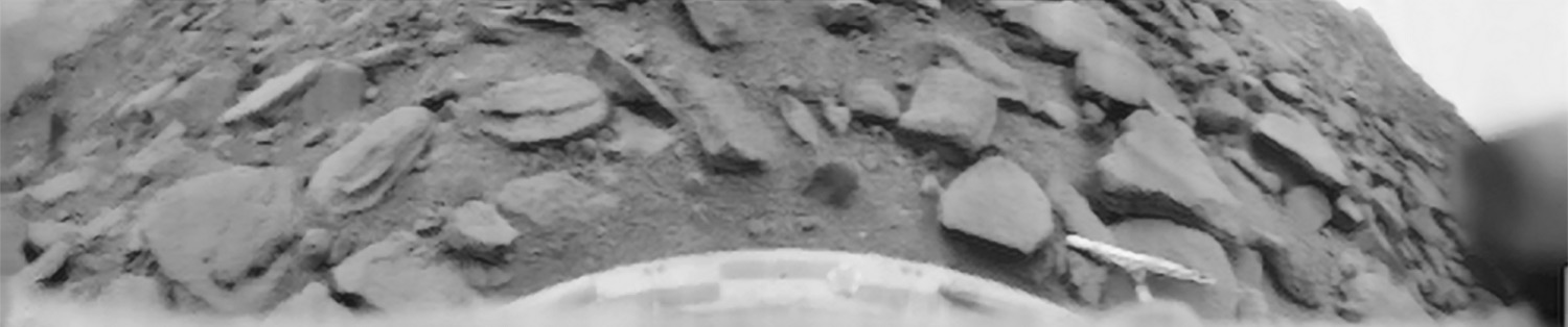 Black and white panorama of flat rocks on the surface of Venus from Venera 9